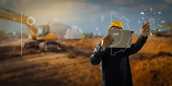 An engineer in a yellow hard hat holding up a tablet at an open excavation site, with planning, connectivity, and analytics icons overlaid on the scene and an excavator in the background.