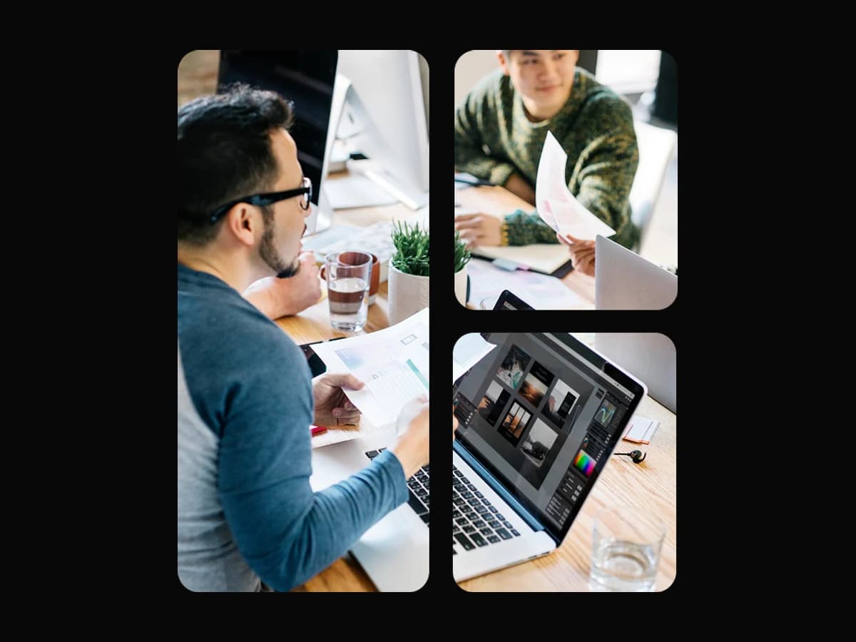 Developers reviewing documents and working on laptops